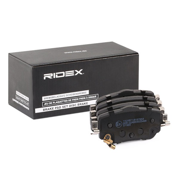 RIDEX 402B1047 Brake pad set Rear Axle, Low-Metallic, with acoustic wear warning