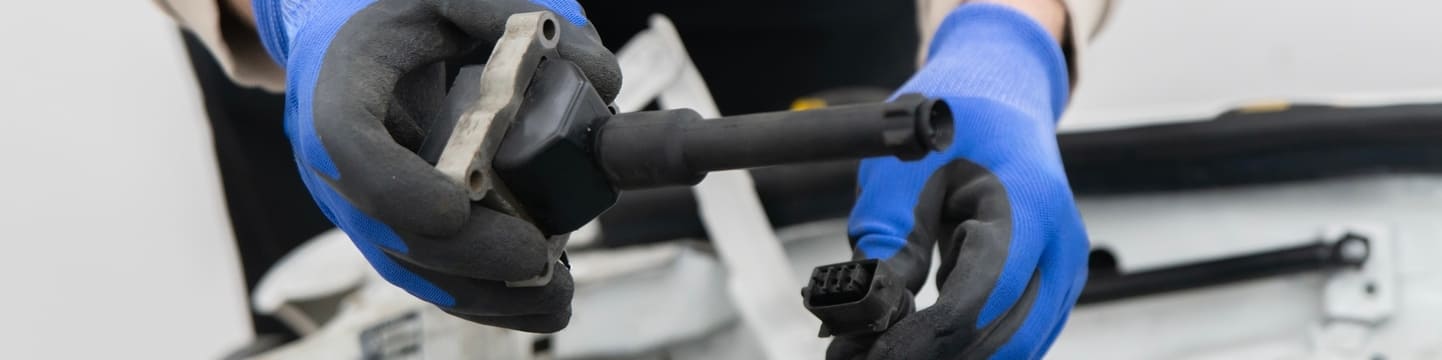 Wofür ist die Zündspule im Auto?